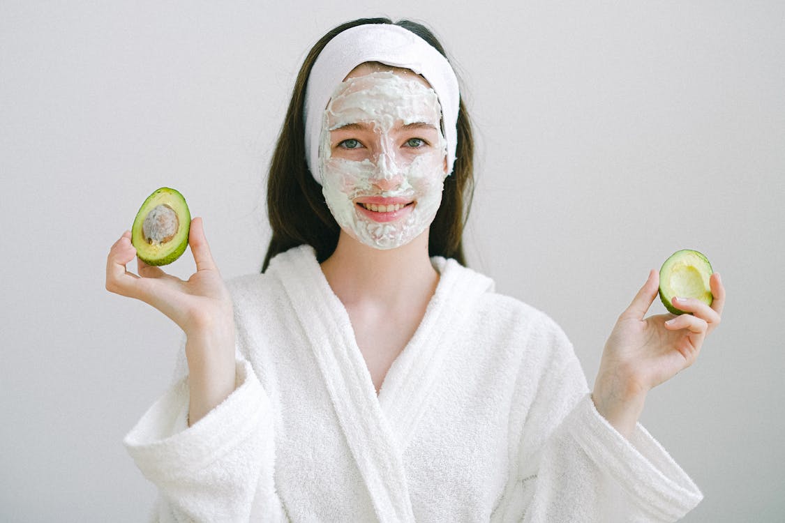 Person with glowing, healthy skin after skincare treatment