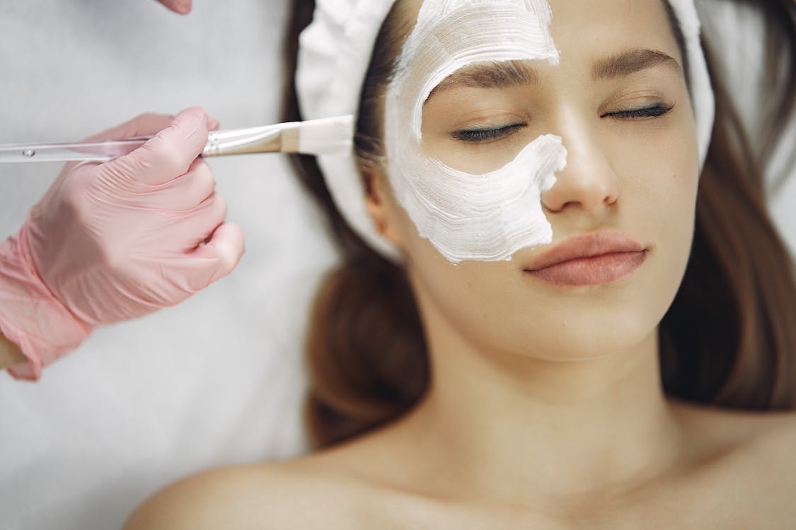 Wellness spa treatment setting with modern light therapy equipment