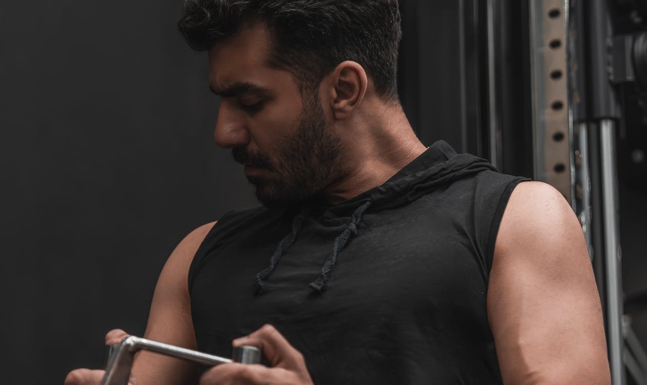 Athletic man recovering after workout in a wellness center