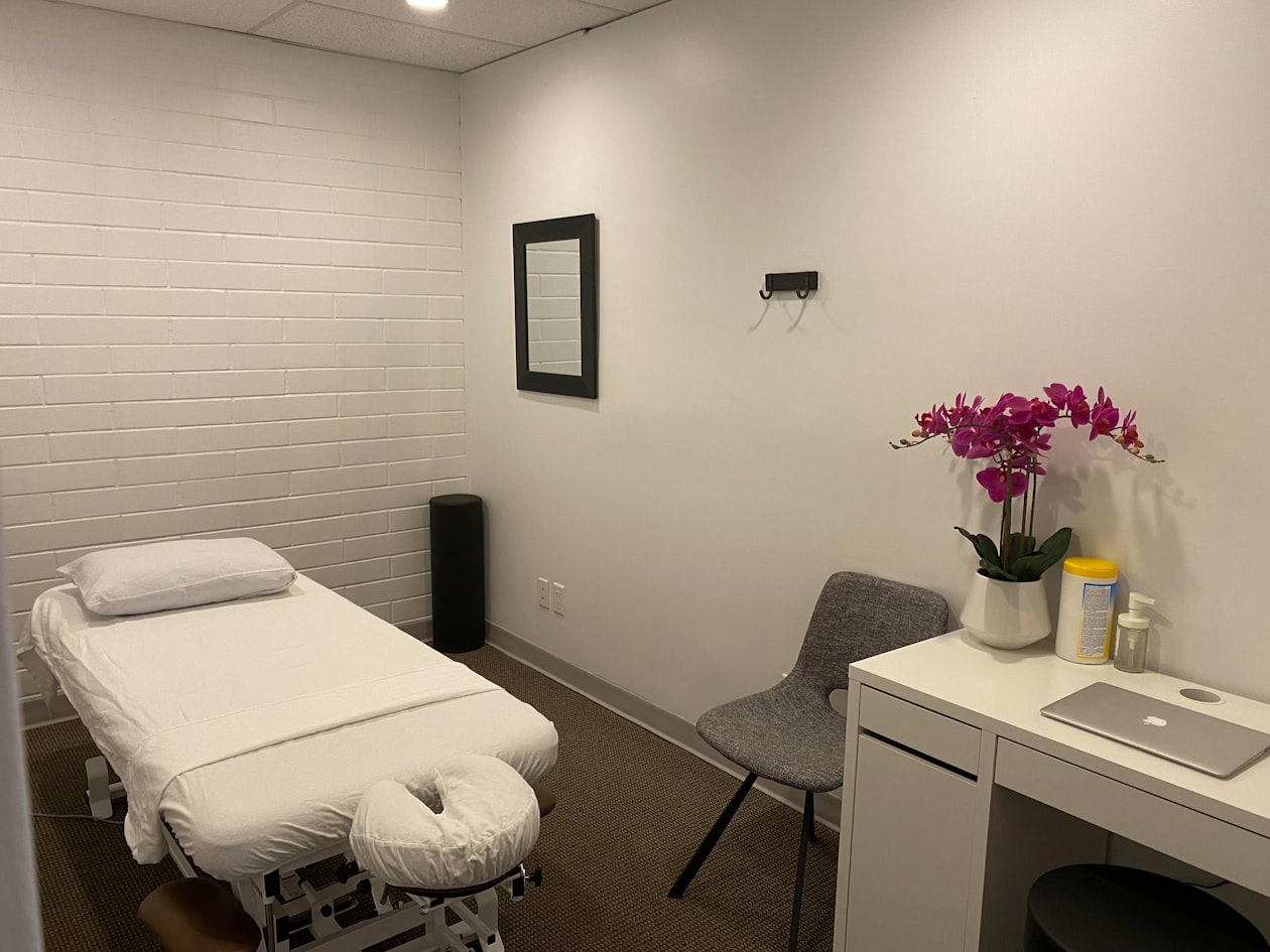 Clean clinical treatment room at a red light therapy spa facility