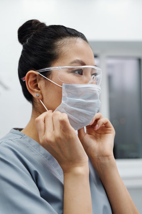 Woman wearing protective eye goggles