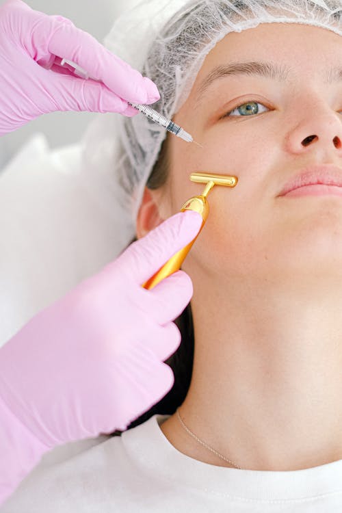 Person receiving a facial wellness treatment