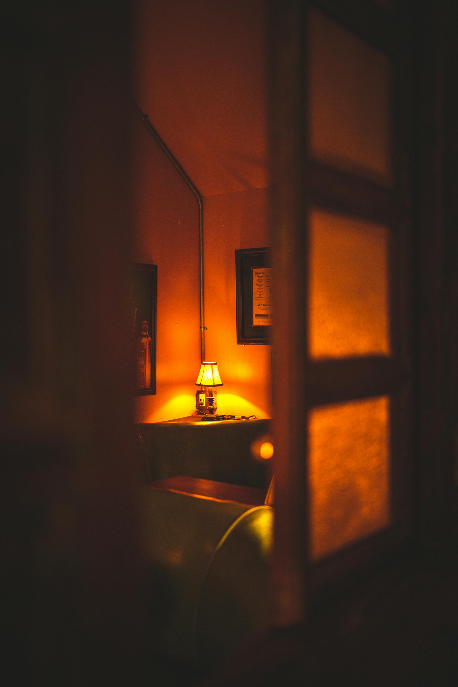 Warm lamp glowing in dark room