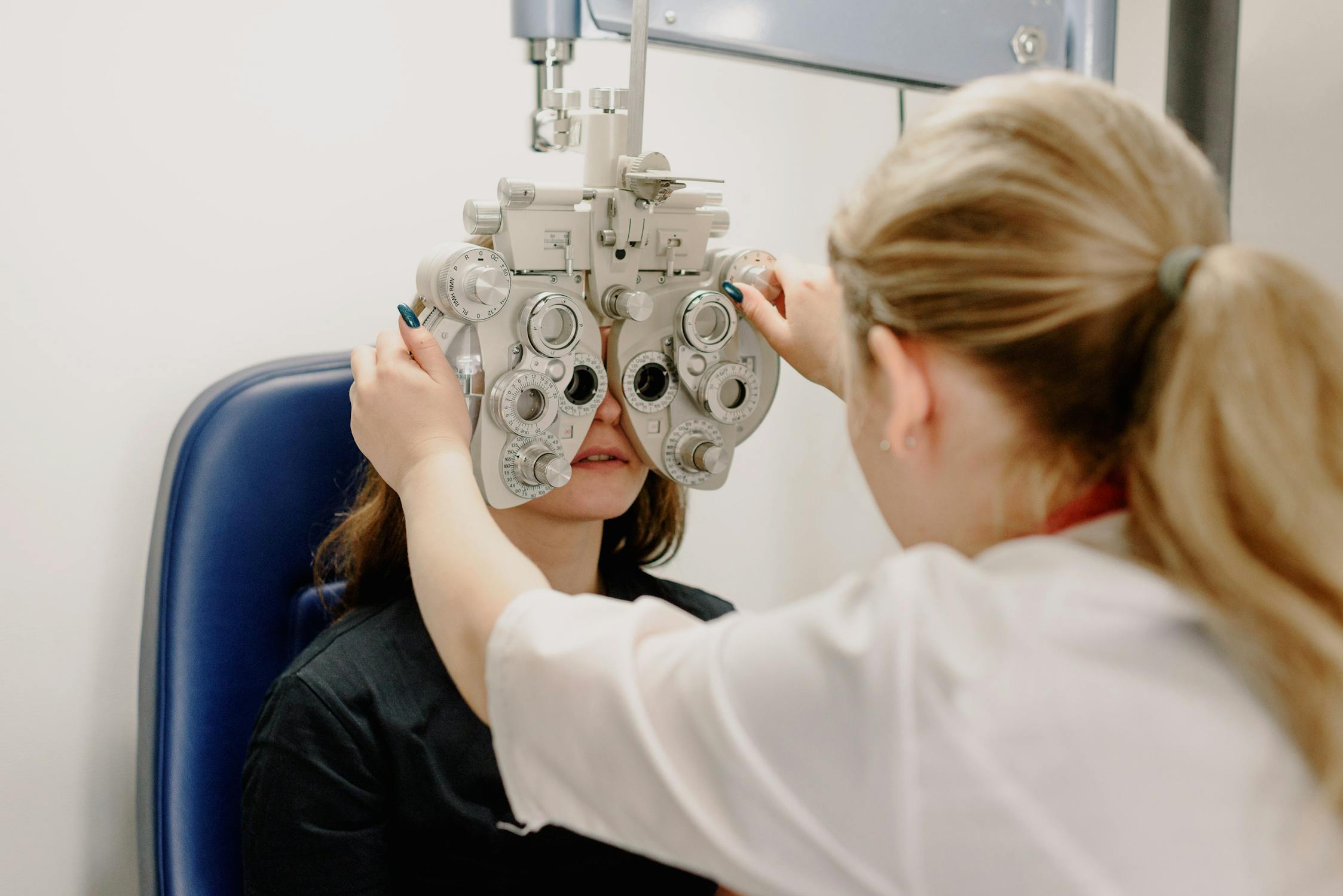 Eye exam at ophthalmologist showing testing equipment